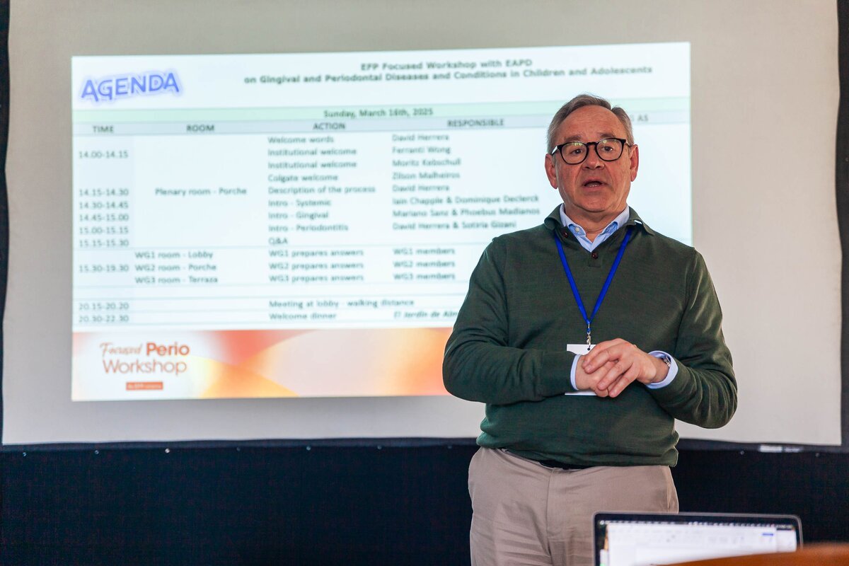 presenter at workshop in front of screen